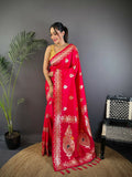 Pink Banarasi woven soft silk saree with traditional intricate detailing and matching blouse fabric.
