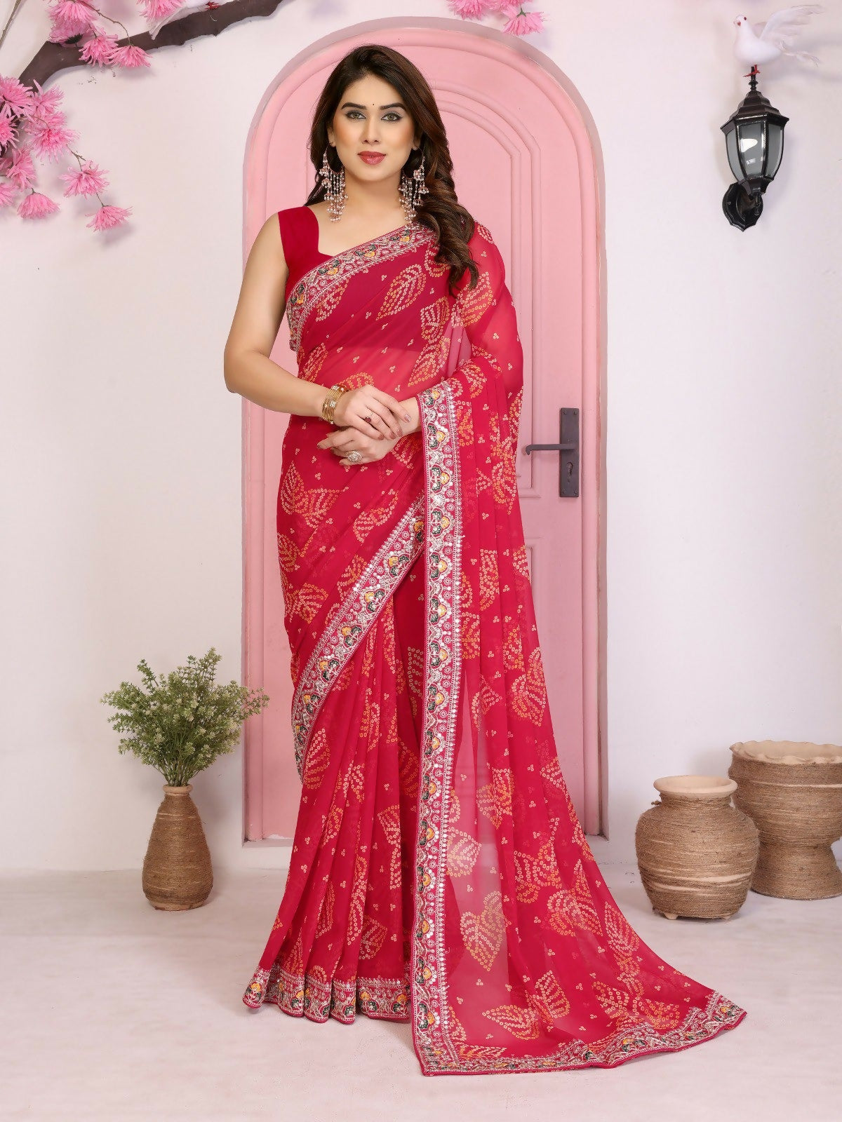 Magenta georgette saree with traditional Rajwadi Bandhani print for party wear
