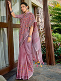 Deep purple linen saree with matching blouse fabric, perfect for festive events.