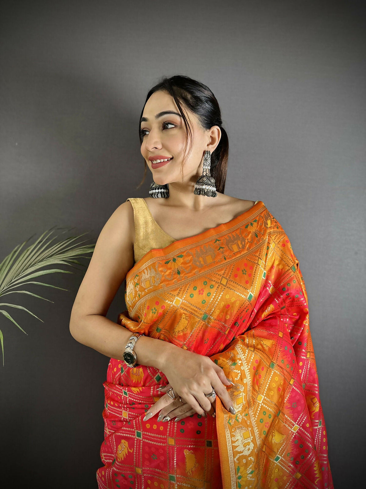 Pastel Orange Geometric Pattern Soft Silk Patola Saree