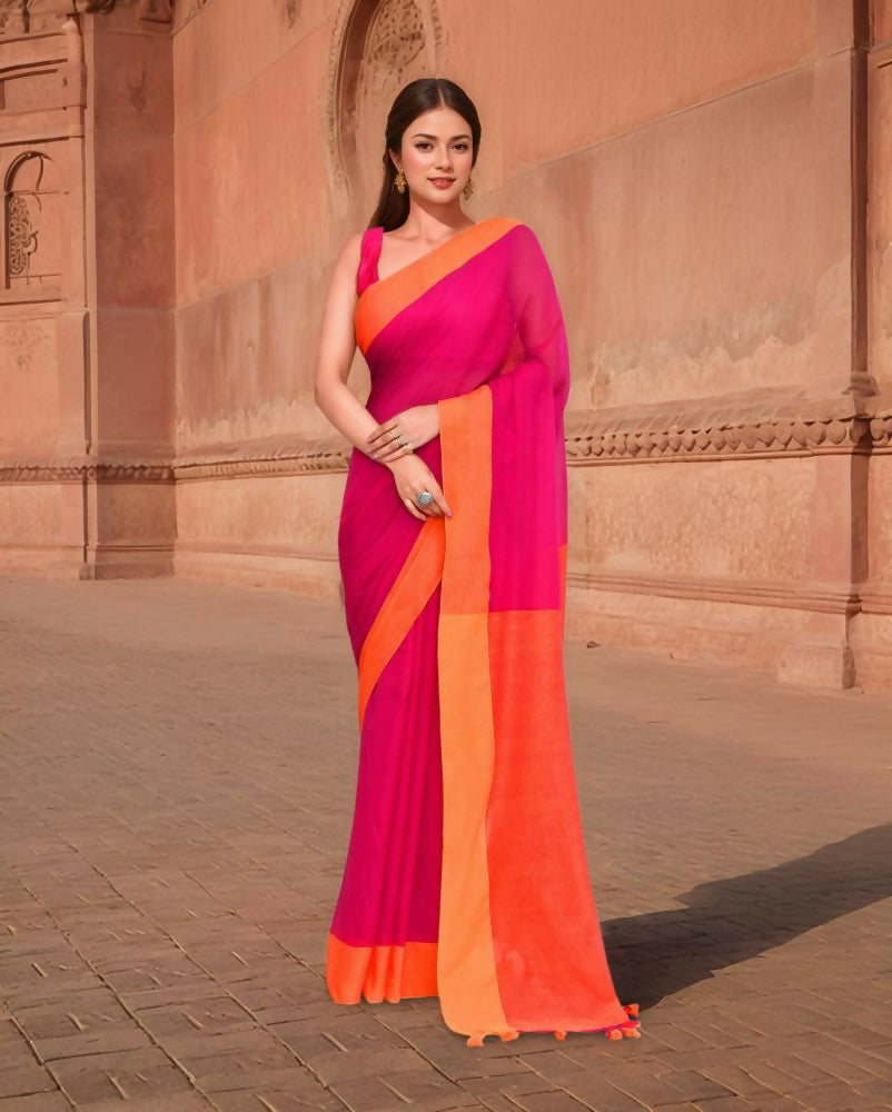 A vibrant orange and pink cotton saree with a trendy drape.