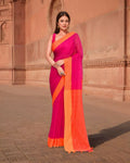 A vibrant orange and pink cotton saree with a trendy drape.