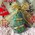 Finished O'Whimsical crochet Christmas tree display for the holidays.