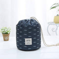 Set of three minimalist navy, grey, and pink waterproof polyester cosmetic bags for travel