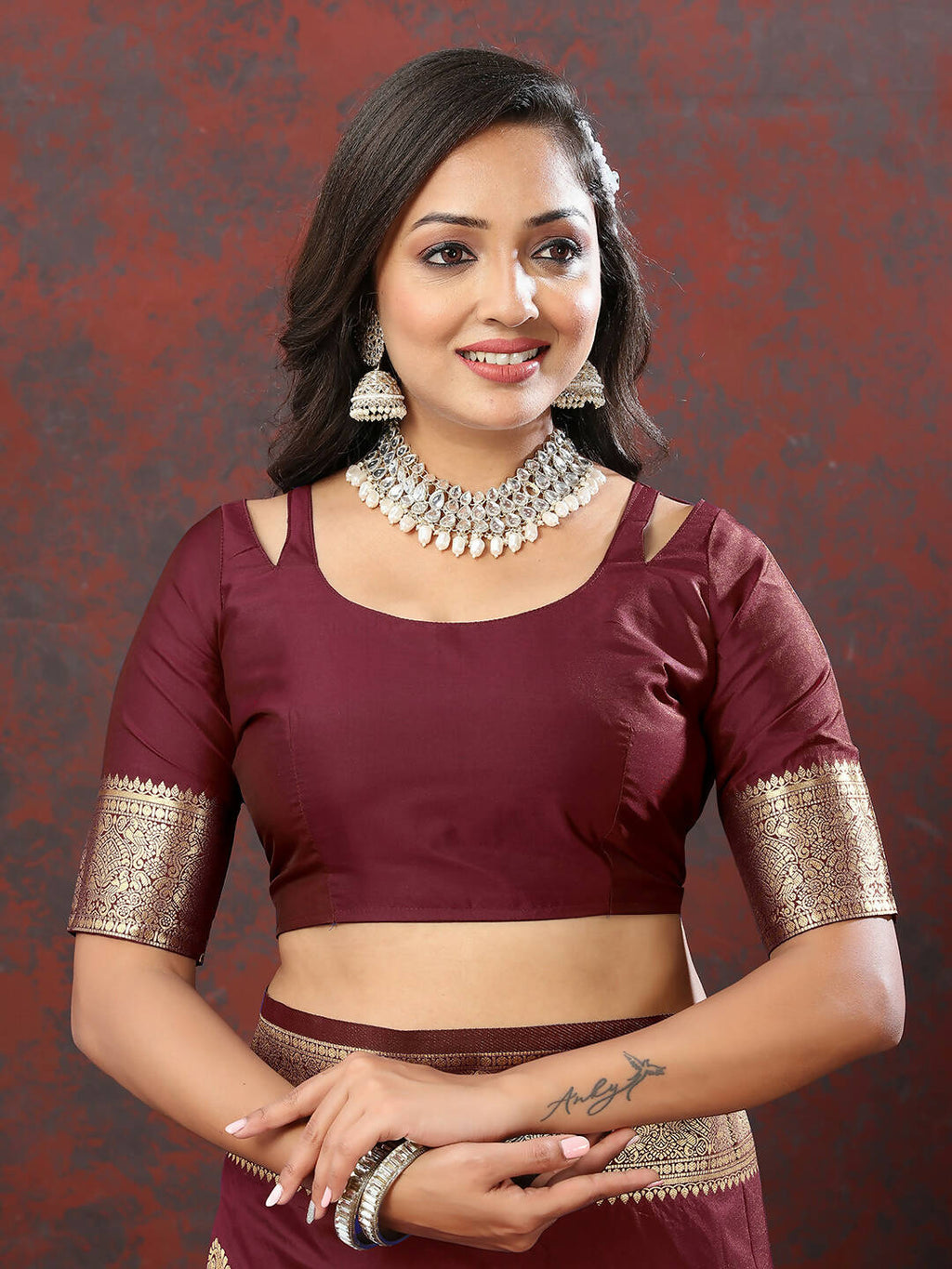 Maroon Soft Silk Saree with Traditional Gold Zari Woven Design