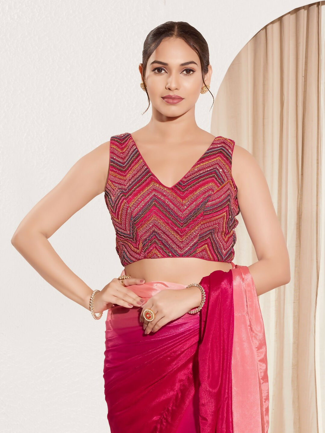 Magenta net padded blouse with V-neckline