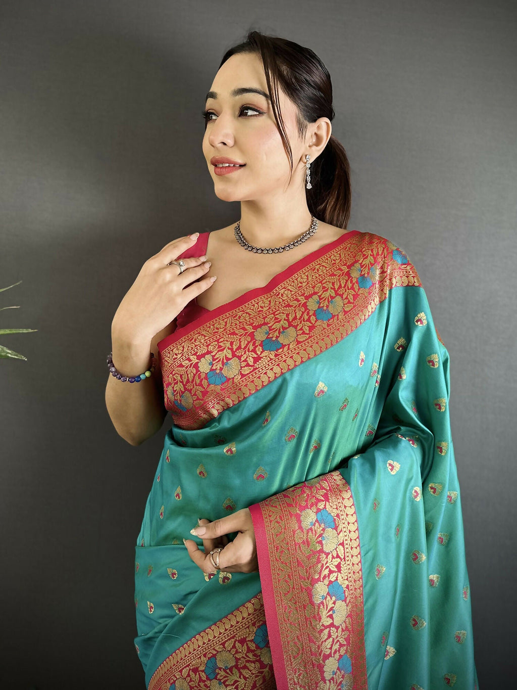 Teal Blue Soft Silk Banarasi Saree with Intricate Motifs