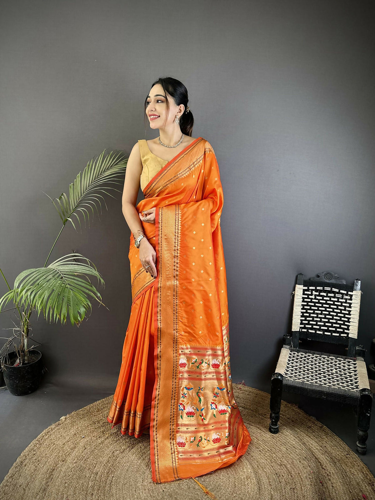 Orange woven butti pattern Lichi silk Paithani saree with matching blouse