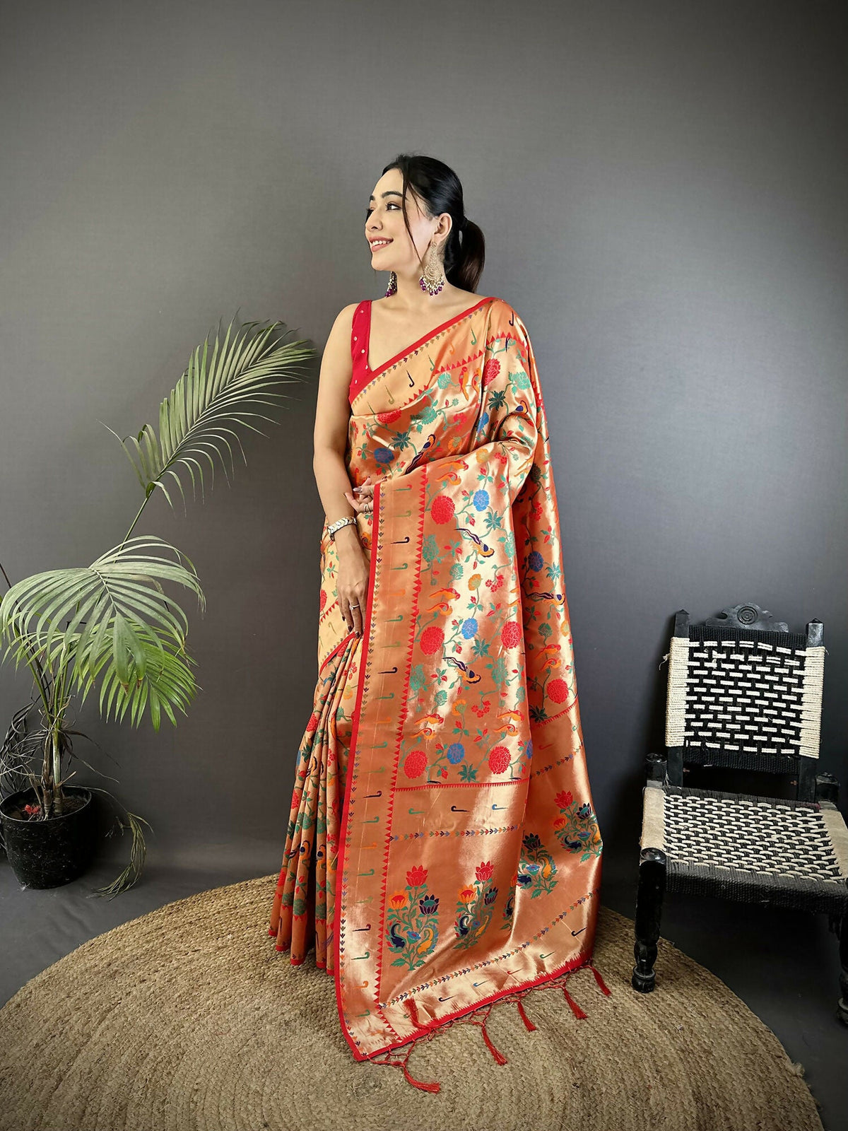Reddish Pink Soft Silk Paithani Saree with intricate Mughal motifs and matching blouse