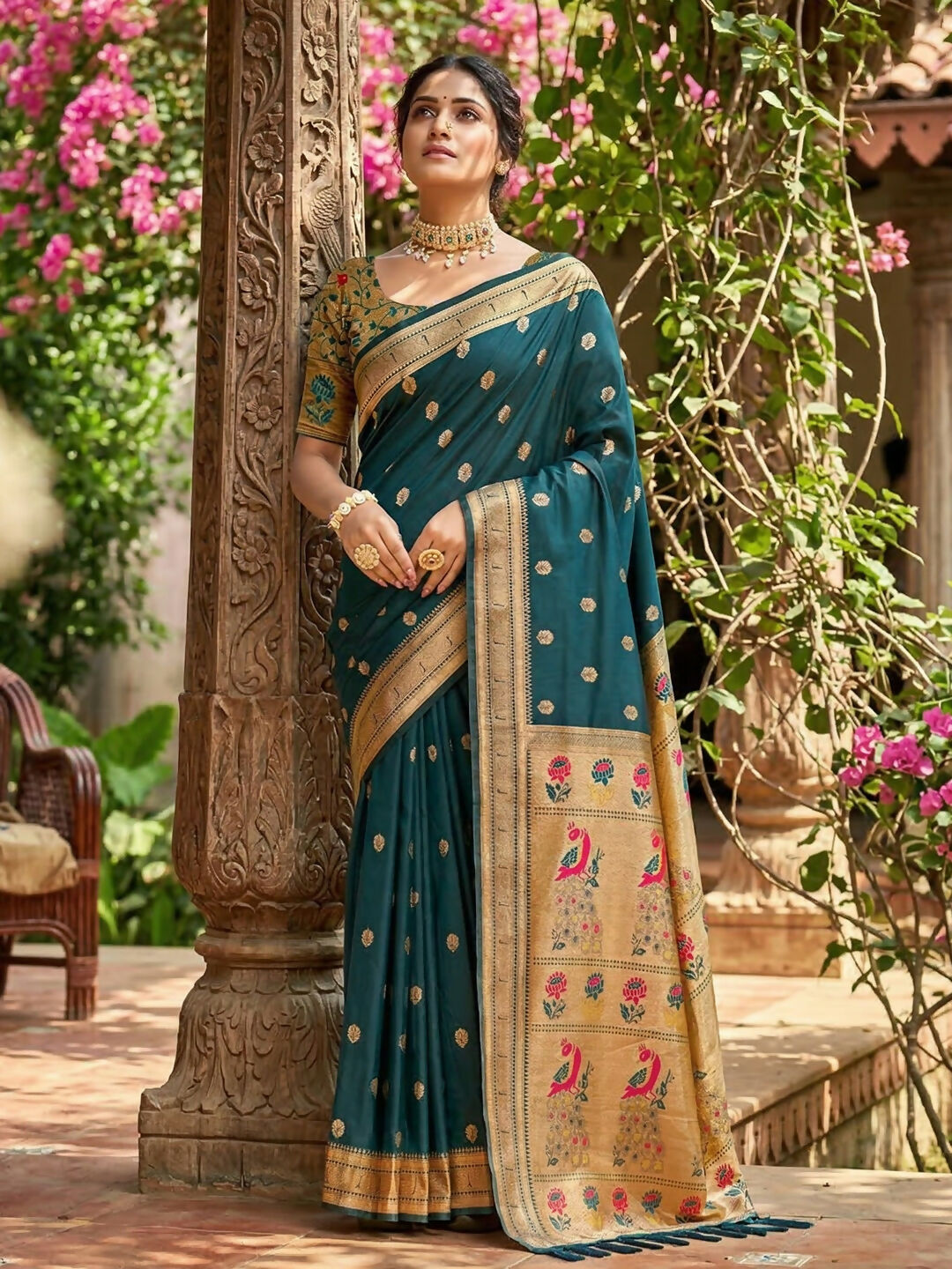 Teal Soft Silk Saree with a contrasting golden blouse