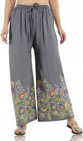 Grey palazzo pants featuring a delicate floral print