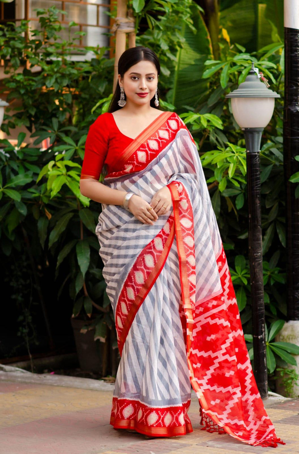 Grey polycotton ethnic saree with ikkat print and zari pattu border