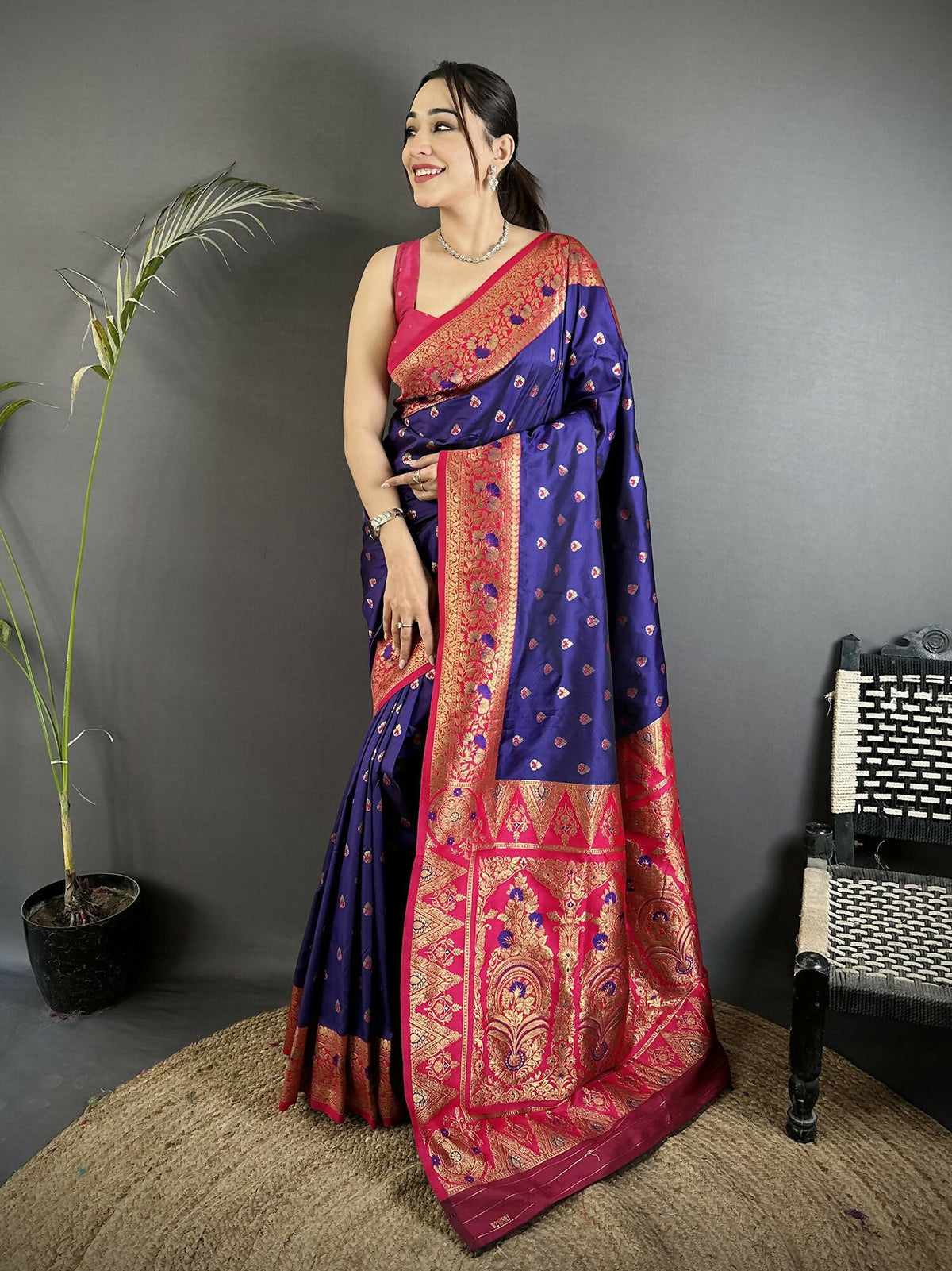 Royal Blue Soft Silk Banarasi Saree featuring intricate motifs and a burgundy blouse
