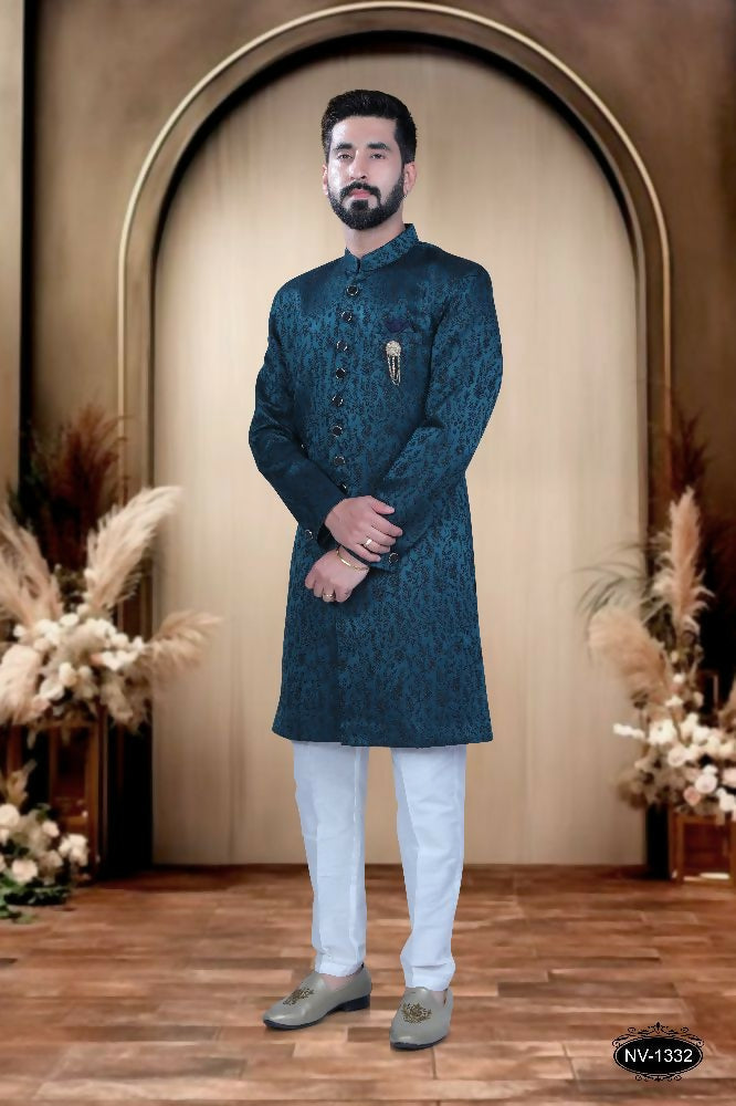 Boys blue satin ethnic kurta paired with matching pyjama trousers for festive occasions