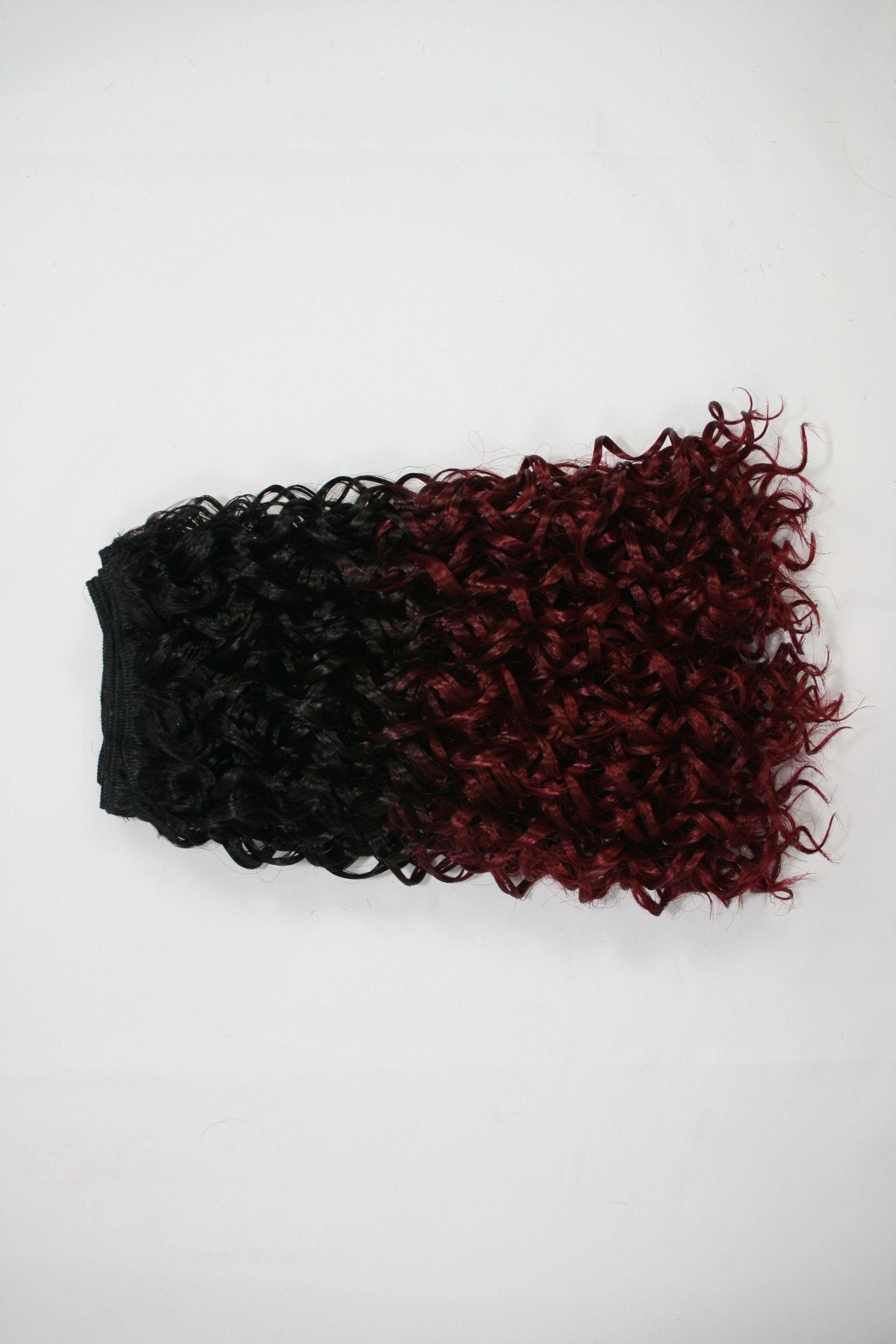A selection of Kanekalon Jerri Curl hair extensions from Pallet 101.