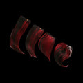 Collection of black and red Kanekalon Jam Wave hair extensions on a pallet