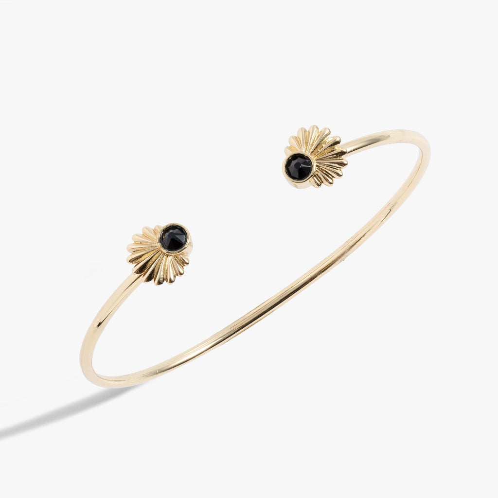 Palm Flex Cuff bracelet featuring onyx black crystal palm motifs on an open silver-tone cuff