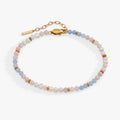 Sandy Peach Ombre beaded anklet with freshwater pearls and faceted semi-precious stones in a gradient pattern.