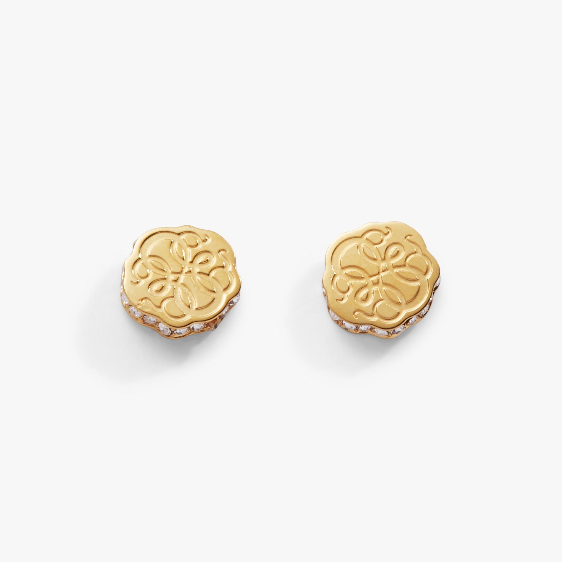 A pair of Path of Life mini stud earrings in polished stainless steel.