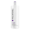 Professional 33.8 fl oz bottle of Paul Mitchell Extra Body Daily Rinse with minimalist white and purple packaging.