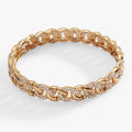 Chunky curb chain stretch bracelet with alternating gold-tone and pave crystal links