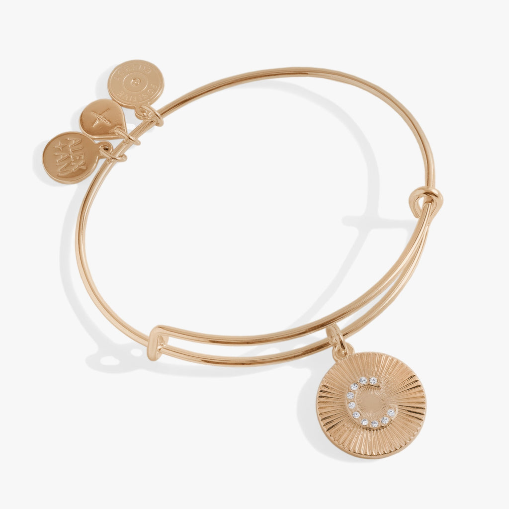 Close up of an Initial C Pave Starburst Texture Bangle bracelet with crystal charm