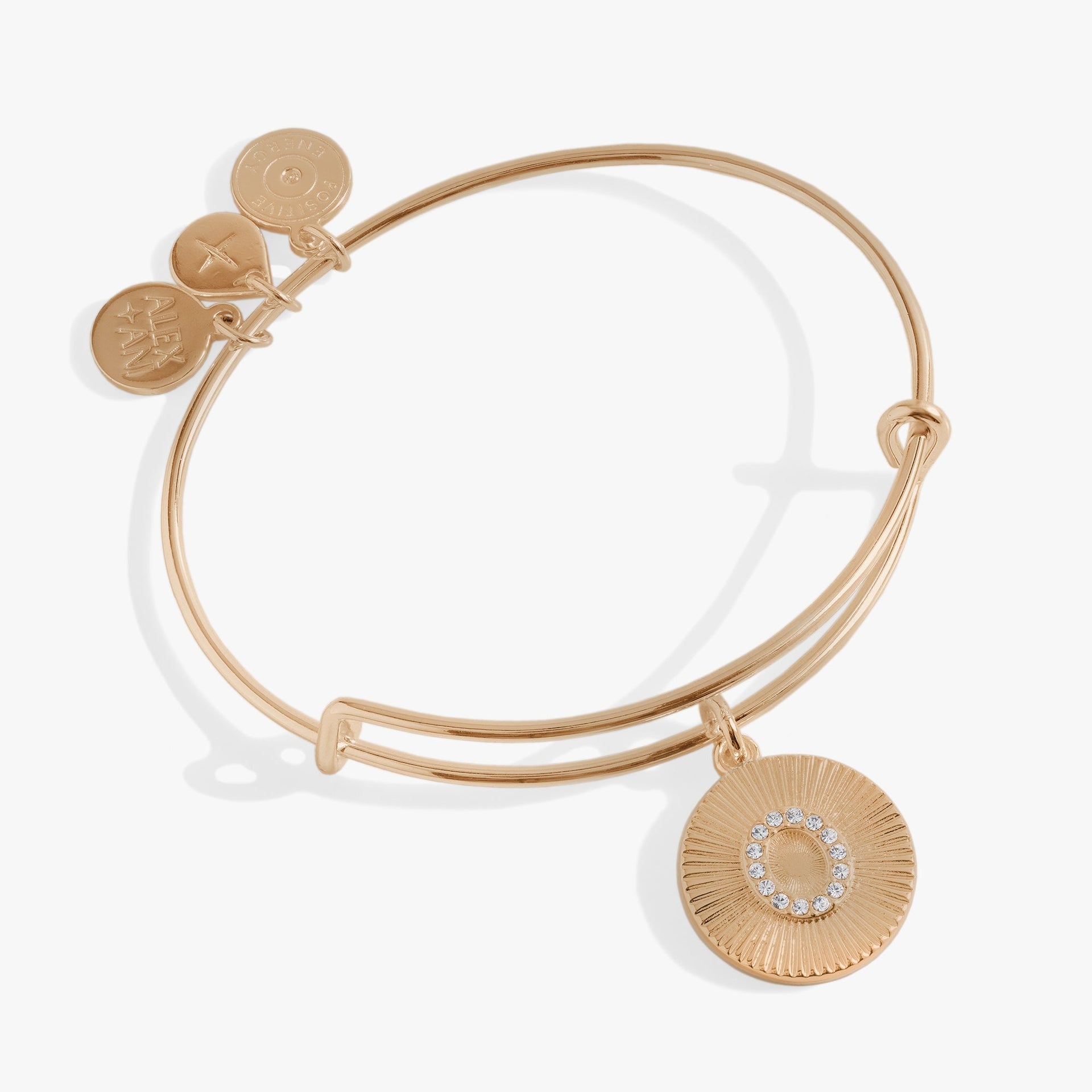 Initial O bangle with pavé crystals, available in gold and silver tone.