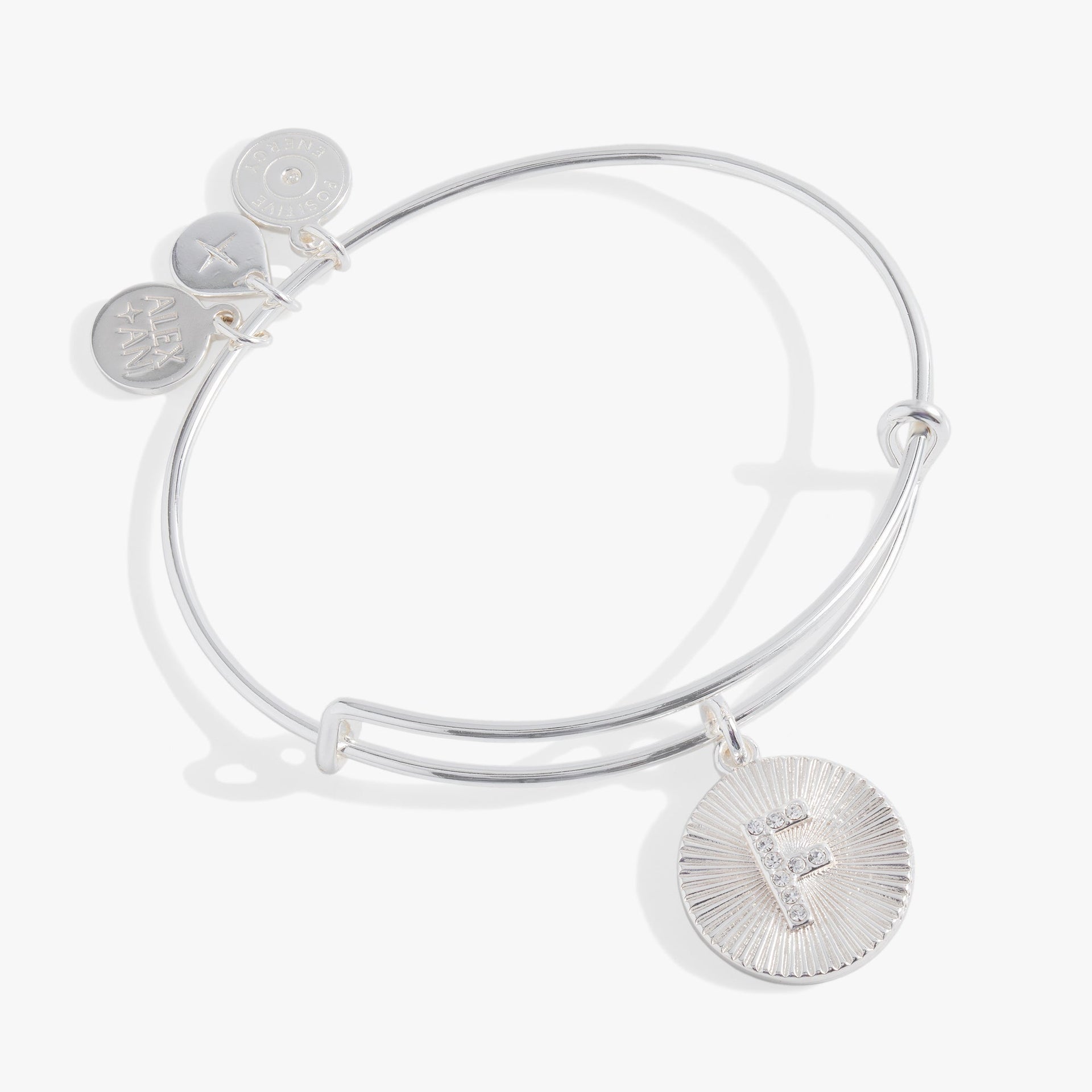 Silver and gold starburst texture bangle with a pavé crystal letter F