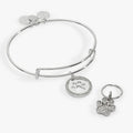 Silver bangle and pet collar charm set with light green accents and sparkling crystals.