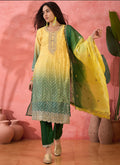 Yellow Chinon Silk A-line kurta with embroidery paired with bottom and dupatta