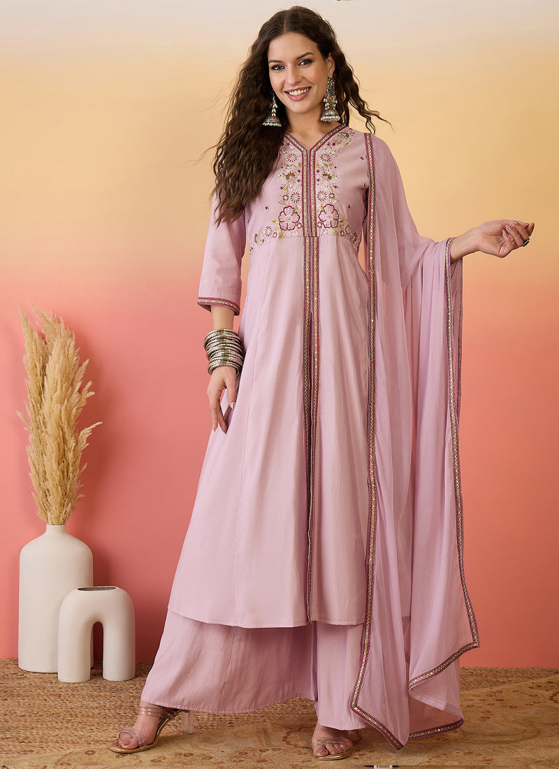 Light pink Roman Silk embroidered A-line kurta paired with palazzo pants and dupatta.