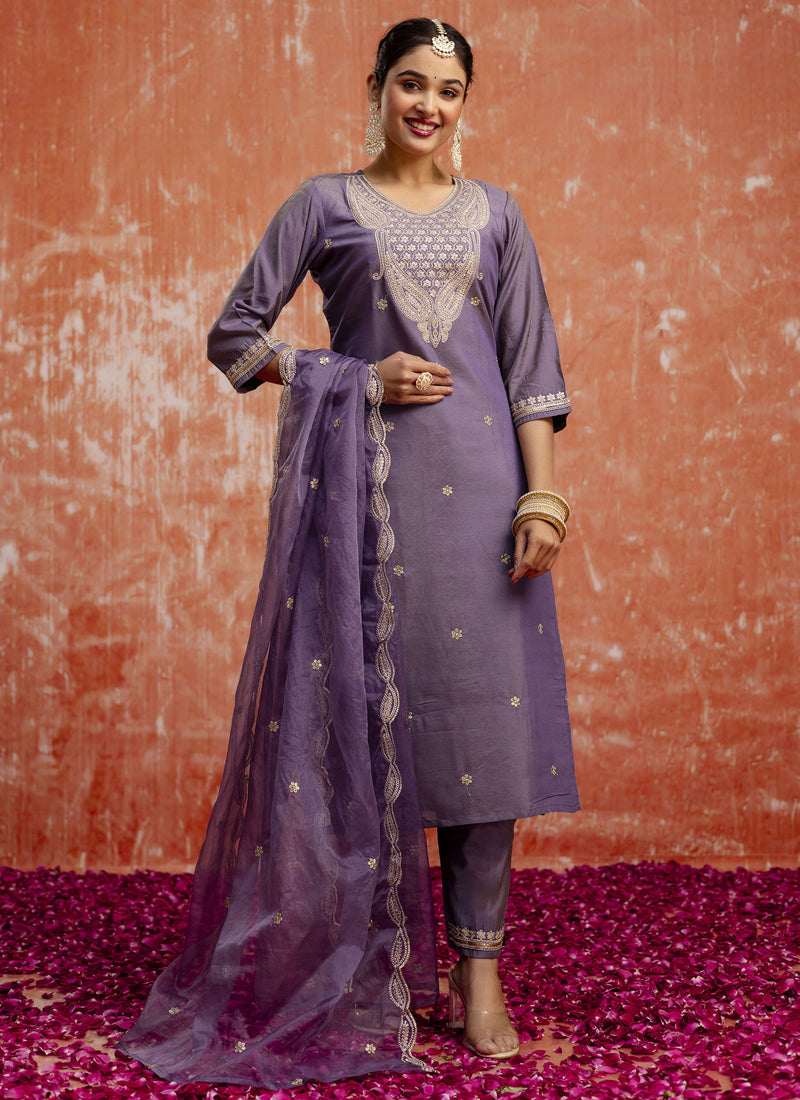 Elegant lavender silk blend salwar suit with detailed embroidery and matching dupatta.
