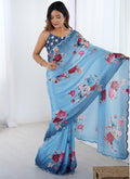 Stylish light blue printed Chinon saree, perfect for parties, with an unstitched blouse
