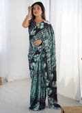 Vibrant multi-colored printed party wear saree made from Chinon fabric