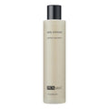 Neutral beige bottle of PCA Skin Daily Exfoliant with black text, minimalist skincare design