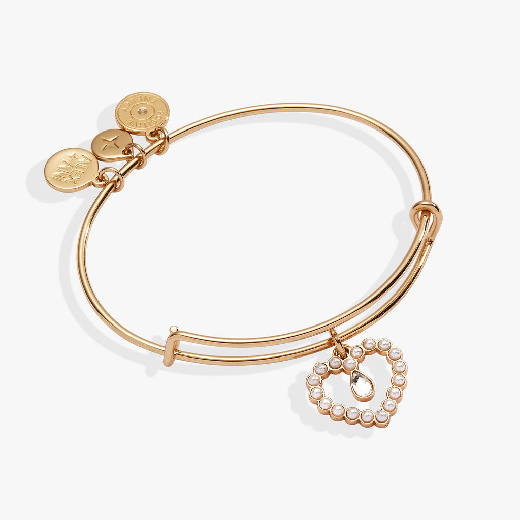 Gold-tone expandable wire bangle featuring a heart charm with pearl and clear crystals.