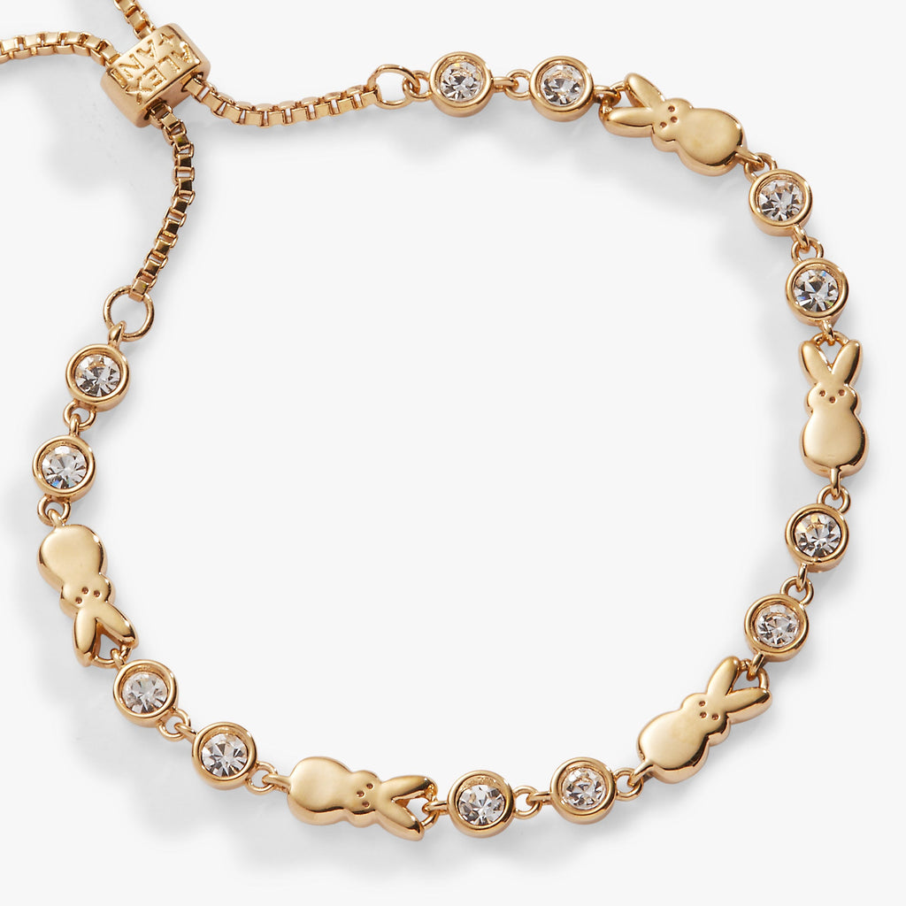 Gold-tone bolo bracelet with PEEPS bunny charms and sparkling clear crystal accents.