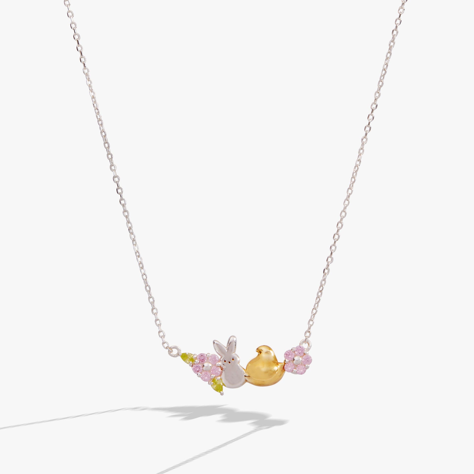 Sterling silver PEEPS® necklace with a gold-plated chick, bunny charm, and crystal flower accents.