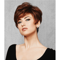 A stylish woman wearing the Perfect Pixie Wig in a rich auburn shade with textured layers.