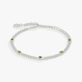 August birthstone curb chain bracelet featuring a luminous green peridot stone