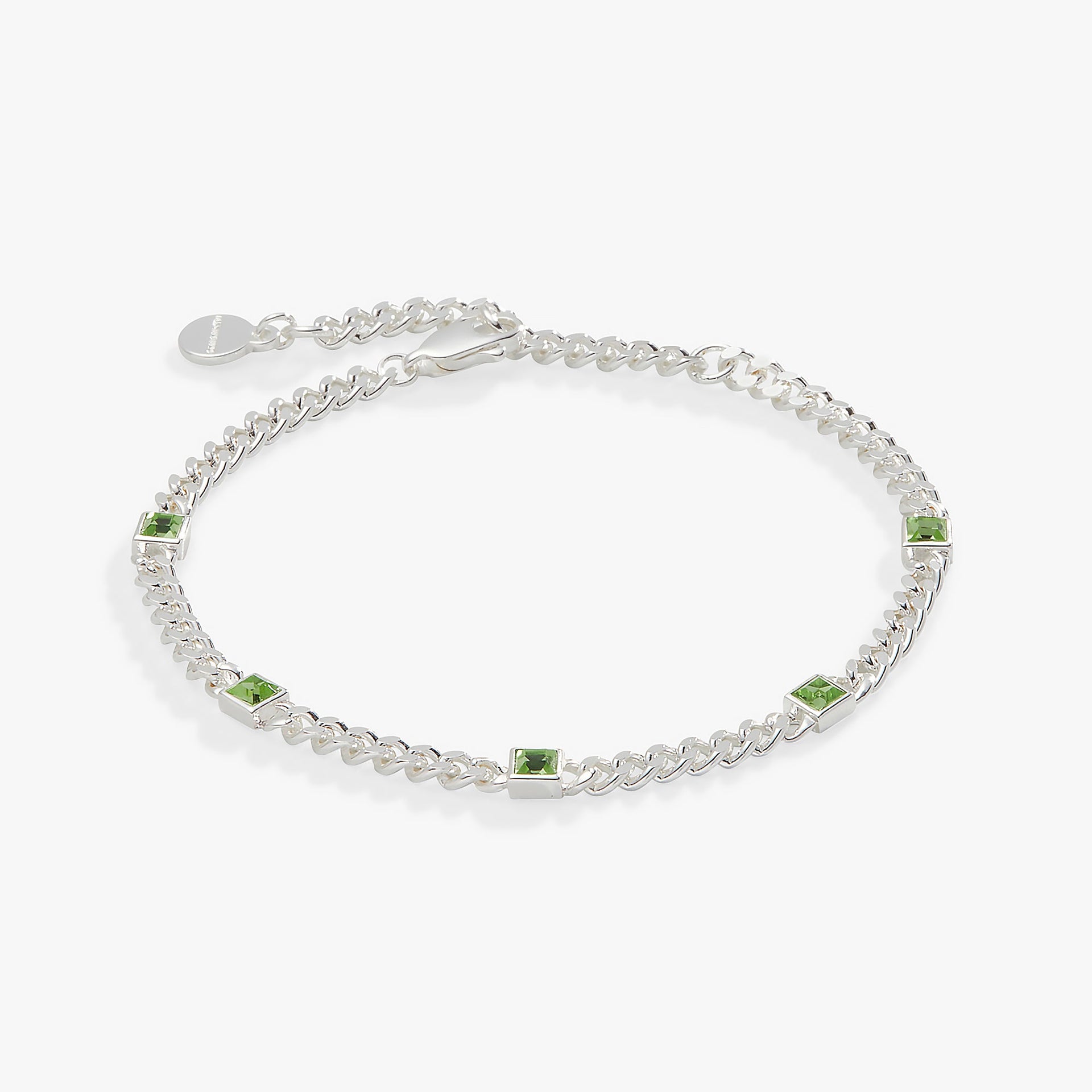 August birthstone curb chain bracelet featuring a luminous green peridot stone