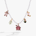 Pink Christmas Beaded Charm Necklace featuring enamel gingerbread, mistletoe, and ornament charms on a pearl-style chain.