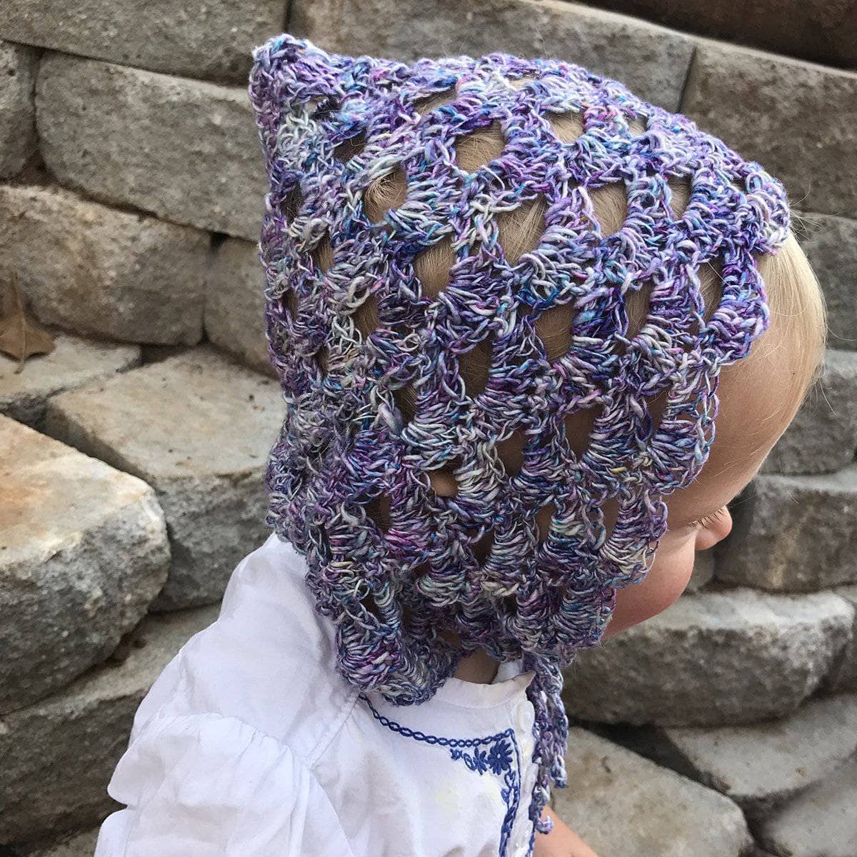 Vintage style pixie bonnet in purple, blue, and white crochet