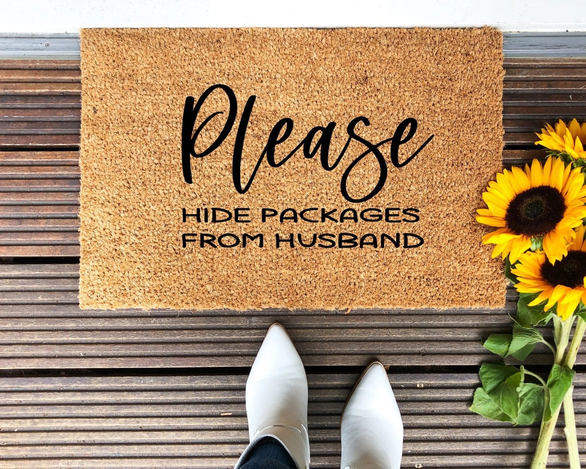 Funny doormat reading Please Hide Packages From Husband with natural coir texture
