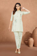 Woman wearing a beige cotton 2-piece kurta set