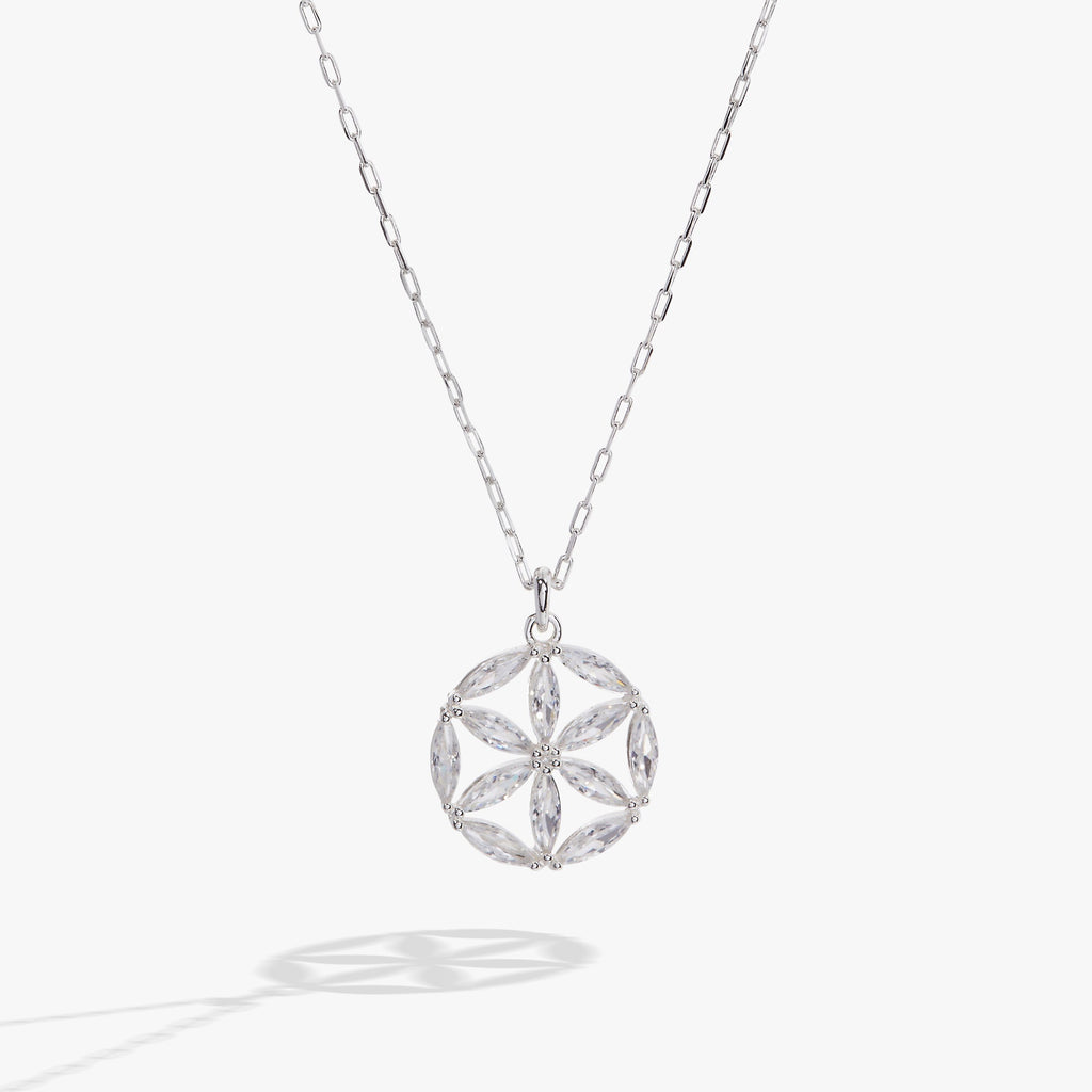 Silver pendant necklace featuring a clear crystal rosette charm on an adjustable chain