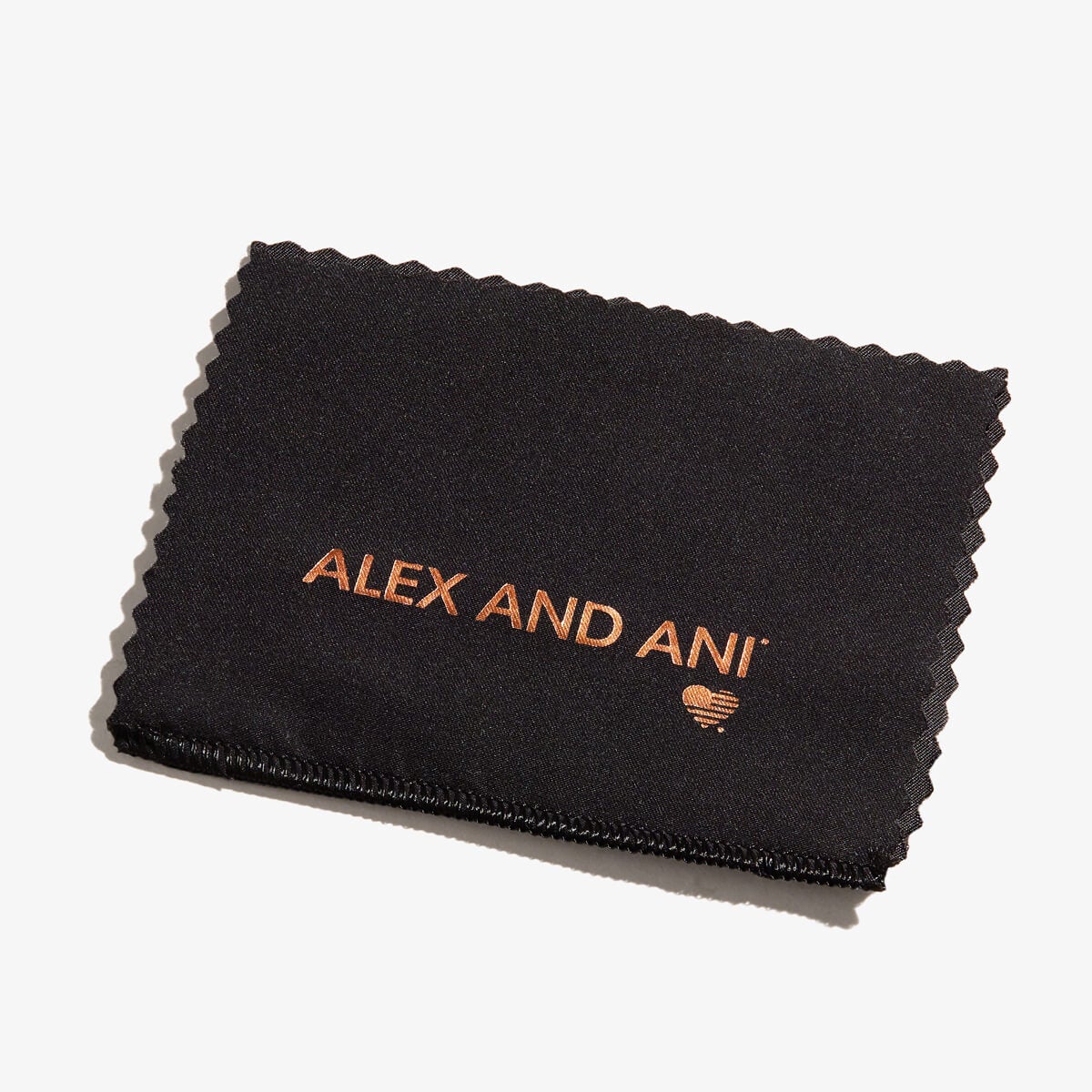 Minimalist black and white jewelry polishing cloth for cleaning precious metals and jewelry pieces.