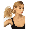 Woman wearing a blonde wavy wrap hair accessory for an effortless messy bun style