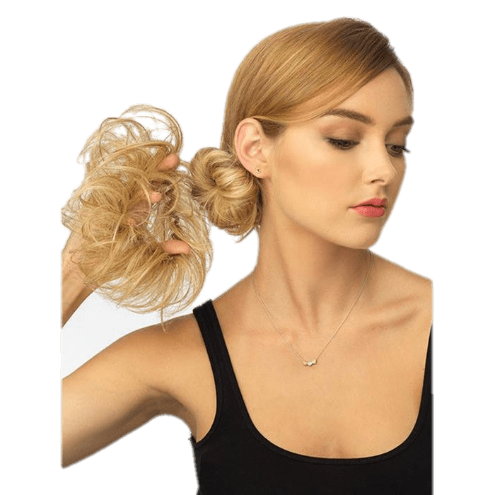 Woman wearing a blonde wavy wrap hair accessory for an effortless messy bun style
