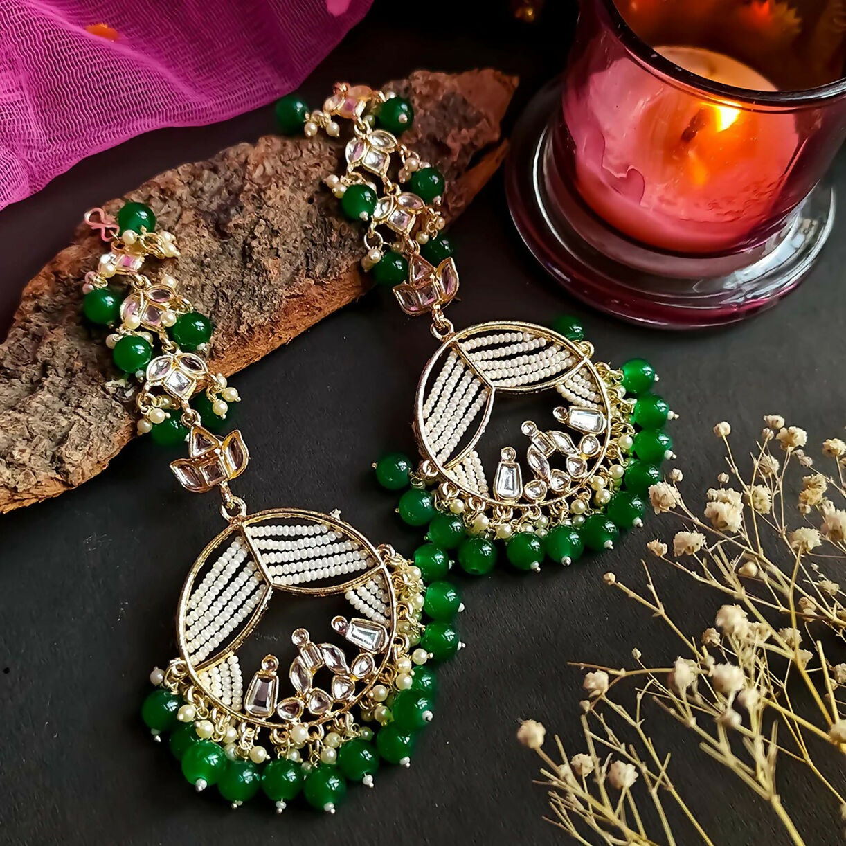 Traditional green Doli Chandbali earrings crafted from brass for ethnic attire.